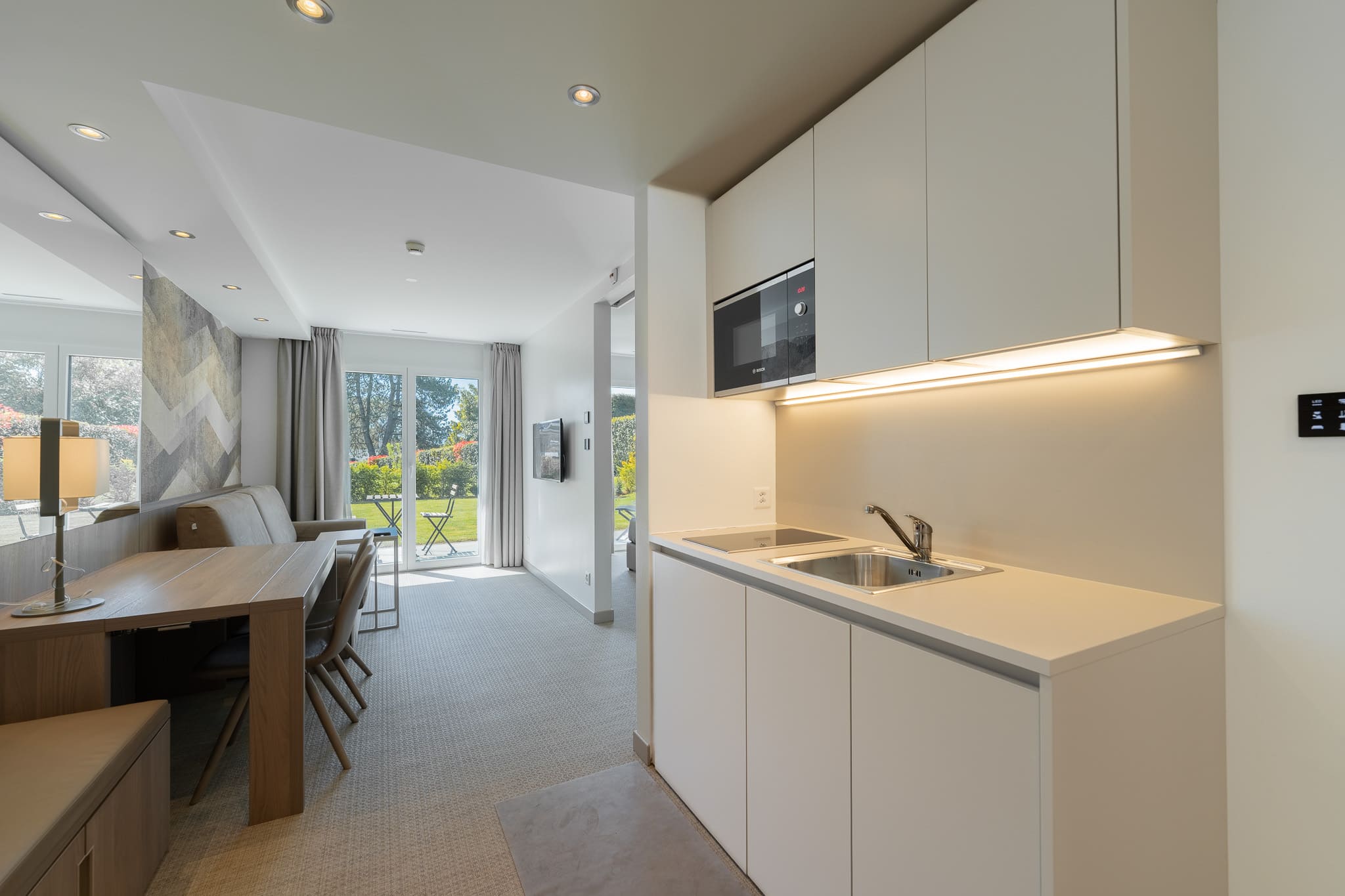 Junior Suites — Séjour et cuisine