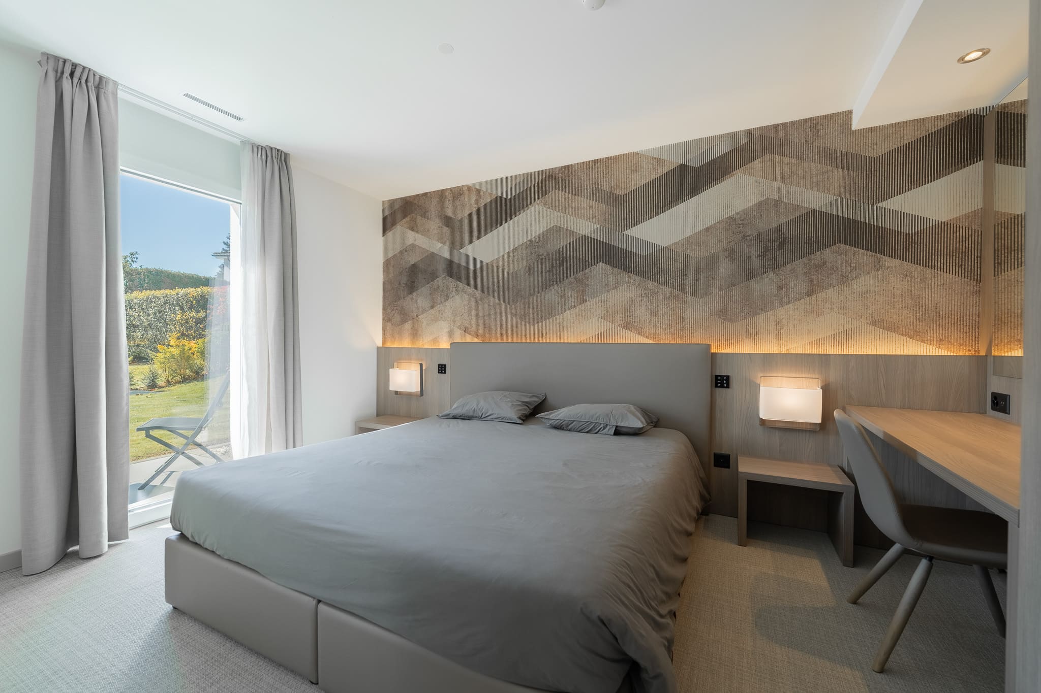 Junior Suites — Chambre, accès jardin