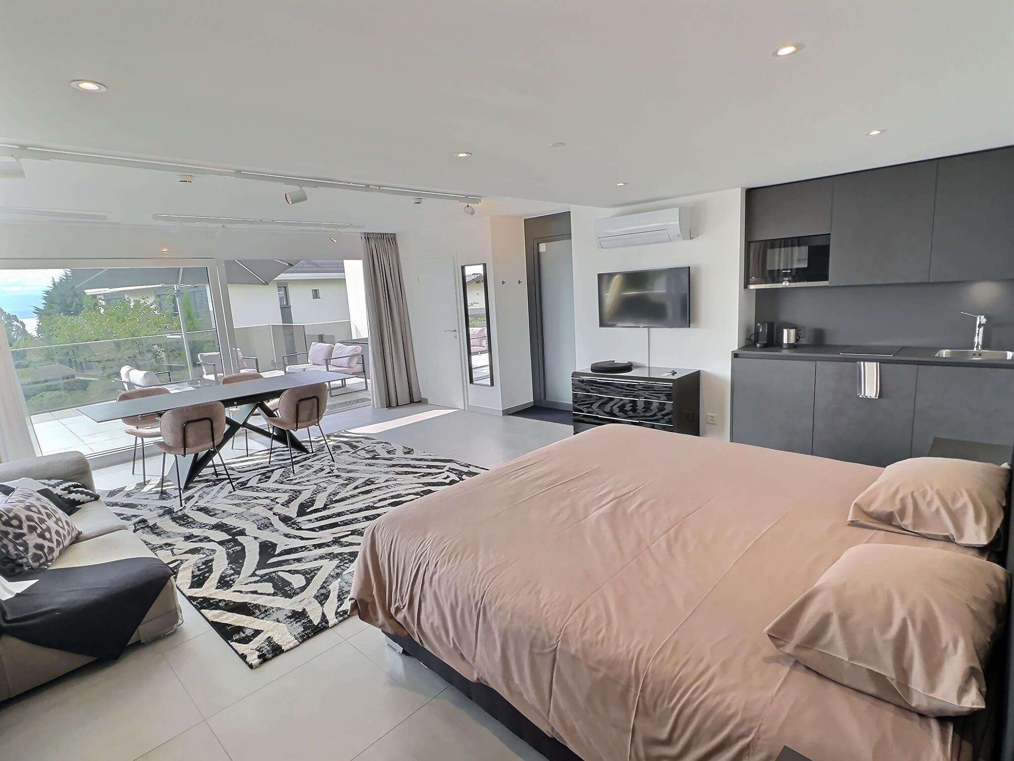 Terrace Suite — Espace nuit ouvert sur la terrasse